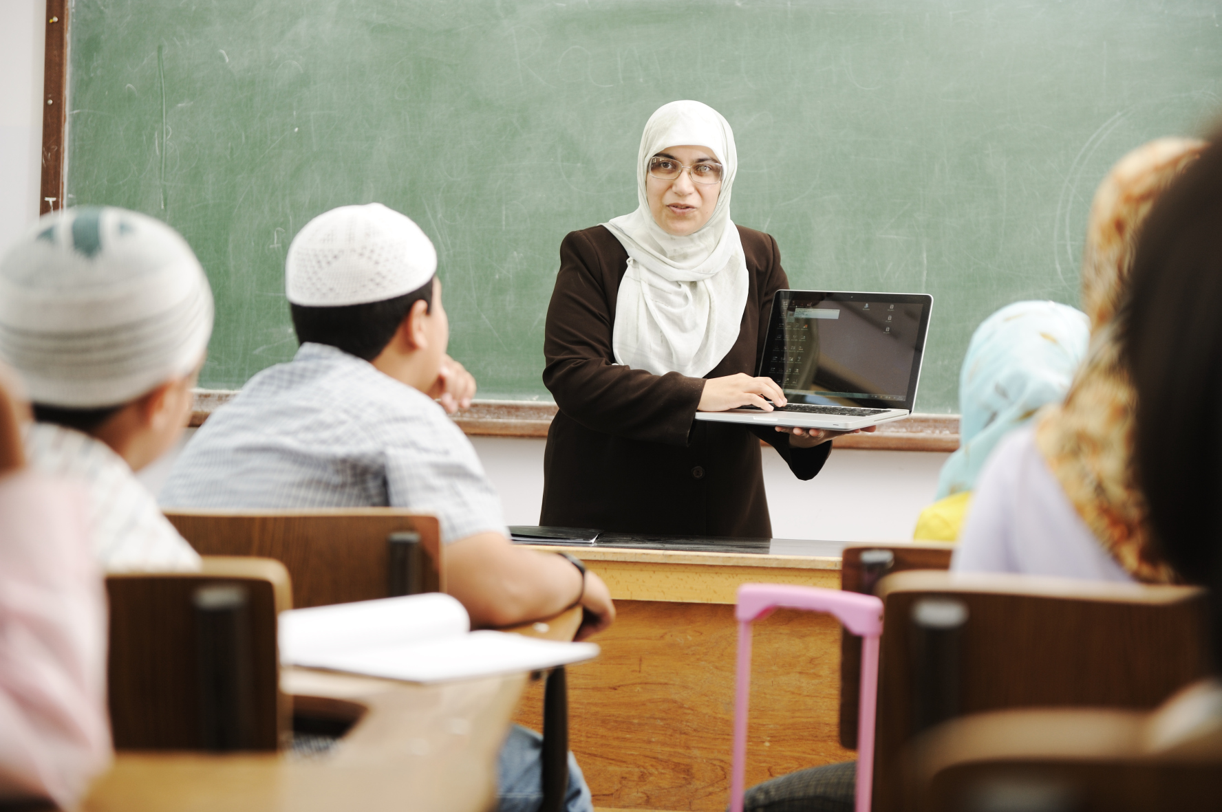 Arab teacher with student