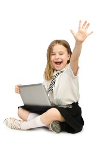 Cute girl with laptop on white