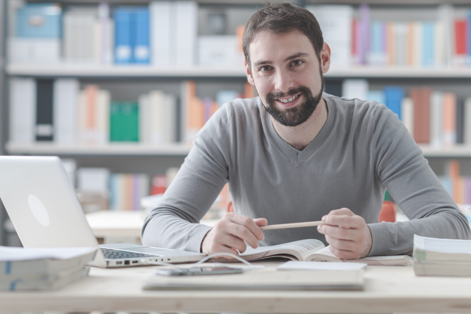 Smiling man working in the office