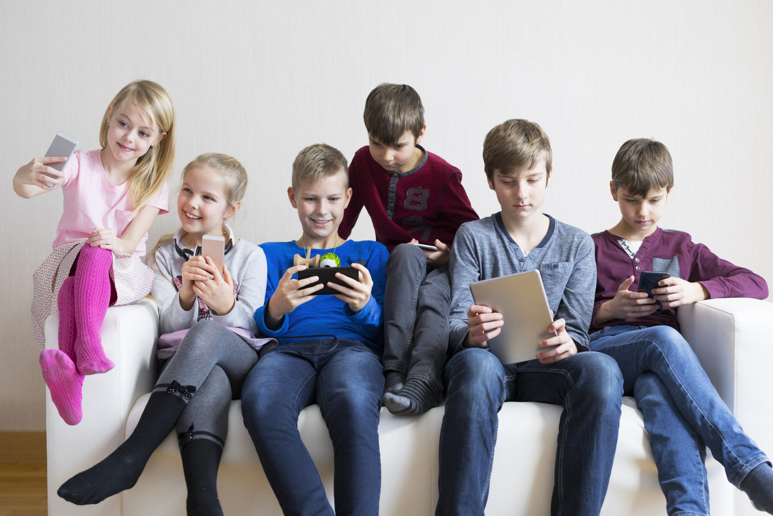 Kids Using Hardware Kids using gadgets. Device addiction concept.